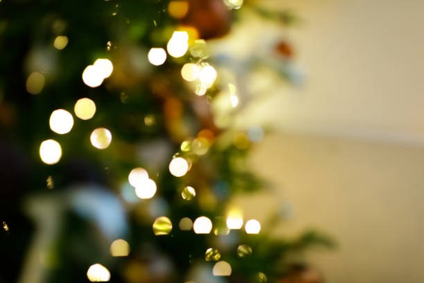 istock blurred chtistmas interior with golden lights 2175588405