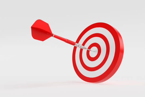 istock Red dart hitting center of target on white background 2175589246