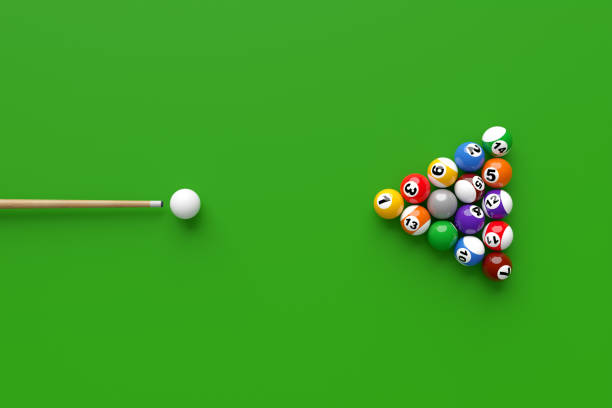 Billiard balls set up for the break on a green tabletop