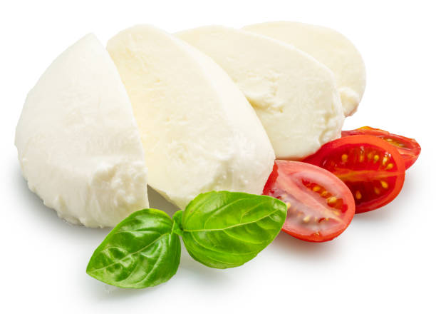 istock Sliced mozzarella cheese with basil leaves and cherry tomatoes on white background. File contains clipping path. 2175590103