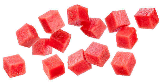 Set of watermelon cubes isolated on white background. File contains clipping paths.