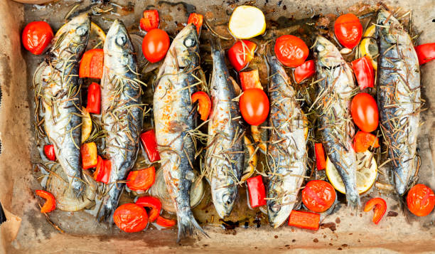 istock Baked sardine fish, food background. 2175592036