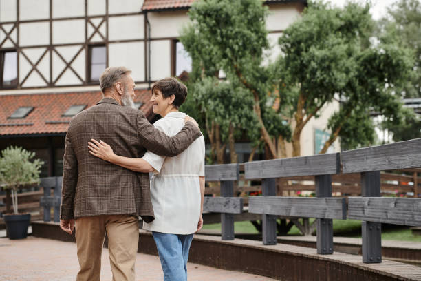 istock A senior couple takes a romantic stroll through a charming village at sunset 2175595200