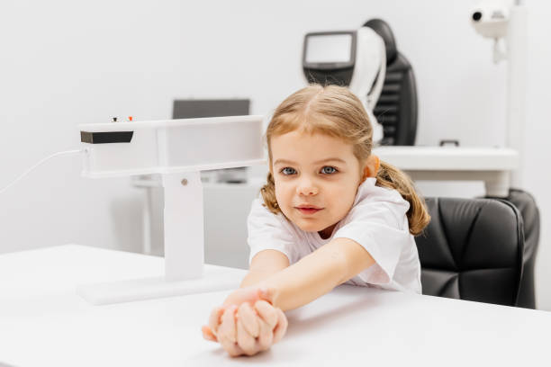 istock A young girl engages in orthoptic and pleoptic therapy using advanced vision stimulation equipment. Laser eye treatment promotes recovery and enhances vision in a soothing environment. 2175597117