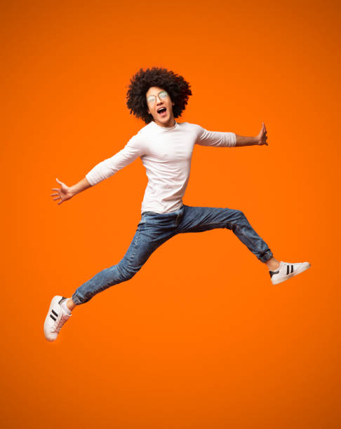 istock Funny young black man walking on air 2175597241