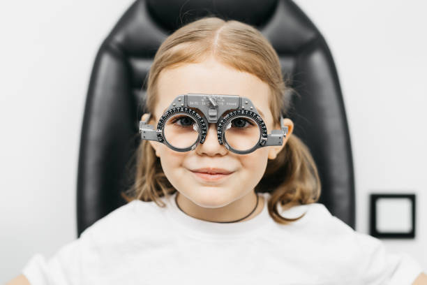 istock A doctor diagnosing a little girl’s vision and selecting lenses using a modern medical device. Perfect for illustrating diagnostics and vision correction. 2175600949