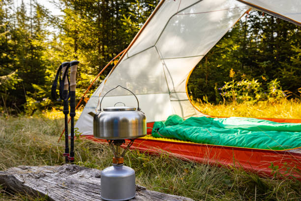 istock Camping with a tent and cooking equipment in the mountains. 2175608205
