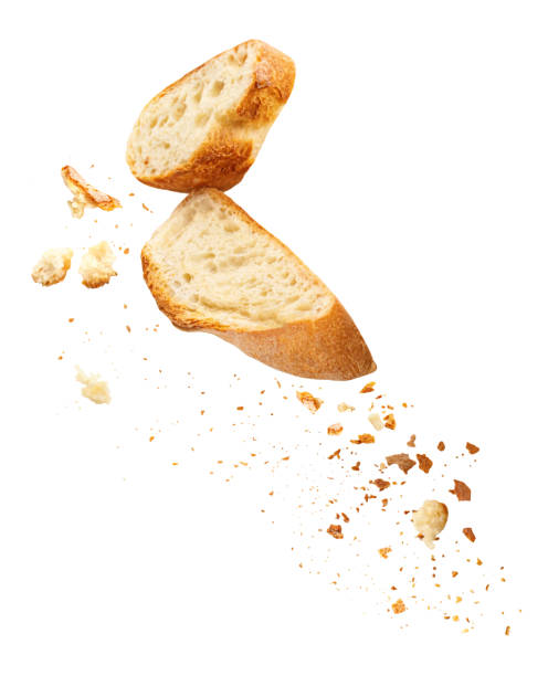 istock Flying Bread Crumbs isolated. Scattered Bread Crumbs Explosion with Cutting slices of wholegrain wheat bread on white background. 2175610140