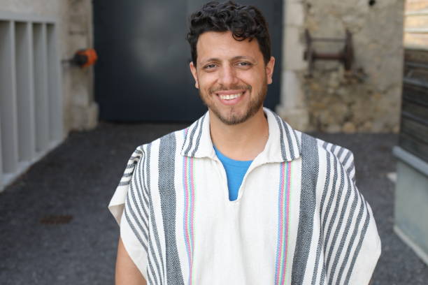 istock Hispanic man wearing a poncho 2175610626