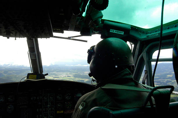 istock pilot takes flying lessons in a helicopter 2175612294