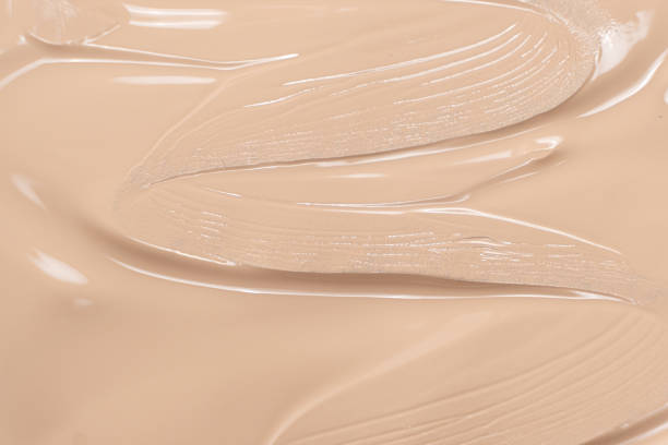 istock Abstract delicate minimalist beige background, cosmetic cream stroke. 2175613734