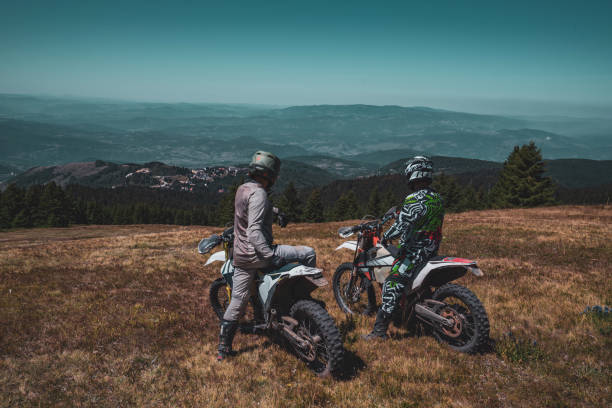 istock Chit chatting on top of the mountain while taking a break after riding 2175615574