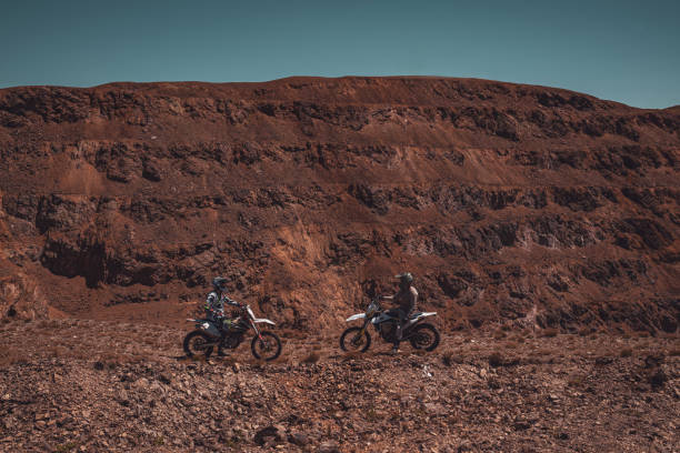 istock Two friends on a motocross adventure 2175616050