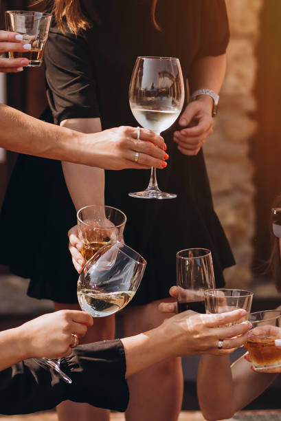 istock Clinking glasses with alcohol and toasting, party 2175622692