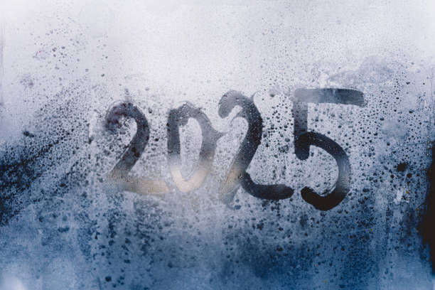 A misty window displaying the year 2025