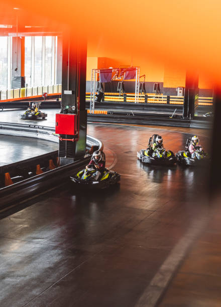 istock Indoor Go-Kart Racing with Drivers on Track 2175626579