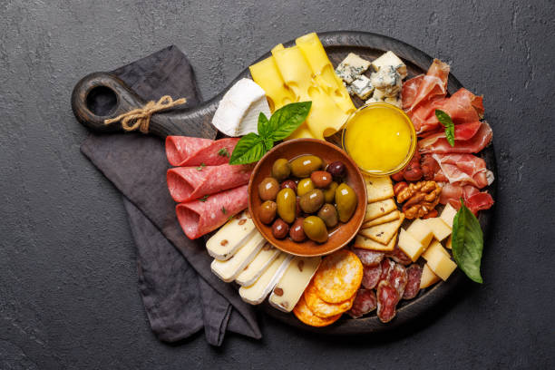 istock A selection of various cheeses and meats 2175637323