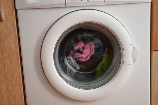 istock a washing machine in operation washing dirty clothes 2175639705