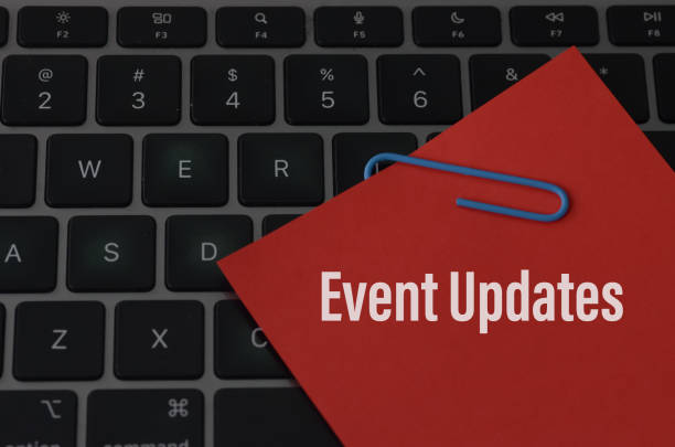 istock The image depicts a keyboard with a red sticky note attached to it, containing the words Event Updates. 2175648832