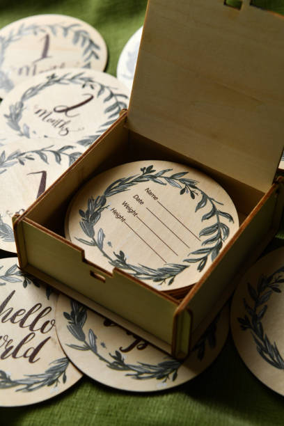 istock Wooden Handmade Coasters to Track Baby's Growth 2175649661