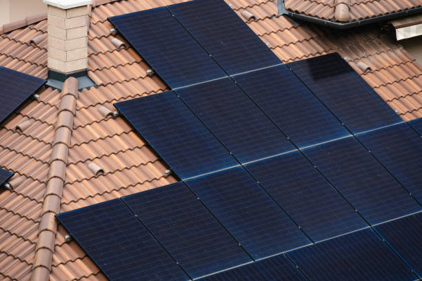 istock Close-up of solar panels on a tiled roof 2175658006