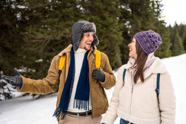 istock Happy couple on a snowy day 2175658540