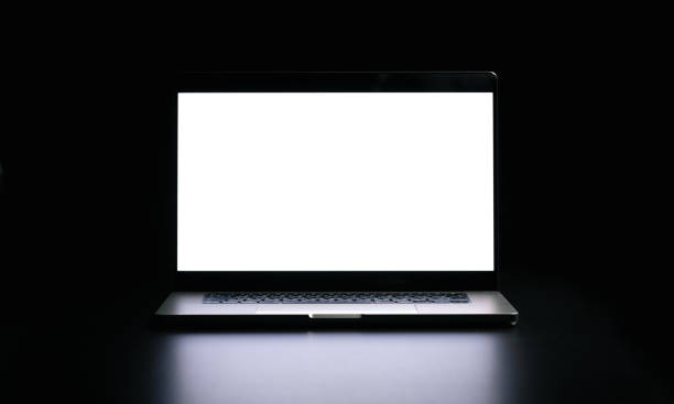 istock Modern laptop with blank white screen isolated on black background. Close up. 2175663061