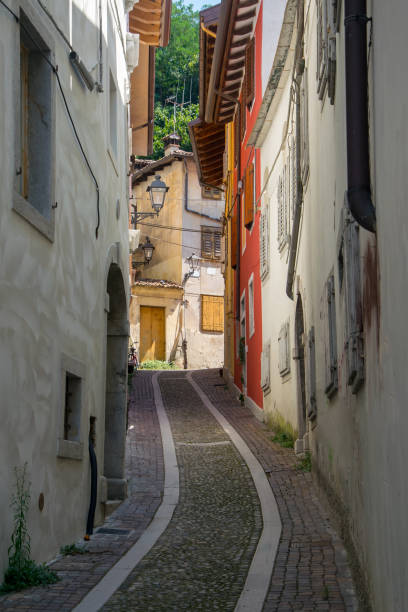 Empty narrow medieval street in Gorizia, Friuli Venezia Giulia, Italy