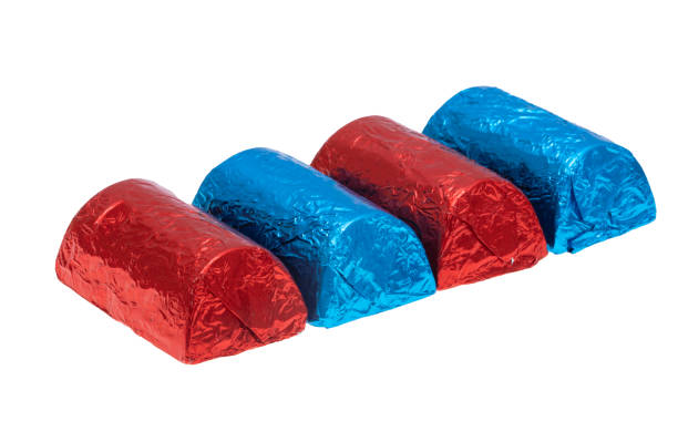istock chocolate candies in foil isolated 2175664511