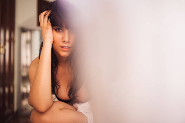 istock Sensual woman in lingerie in modern flat 2175669950