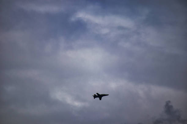 istock Advanced trainer jet against moody grey sky 2175670737