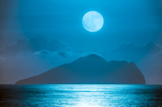 istock Moonrise over Turtle Island, Yilan, Taiwan. 2175670927