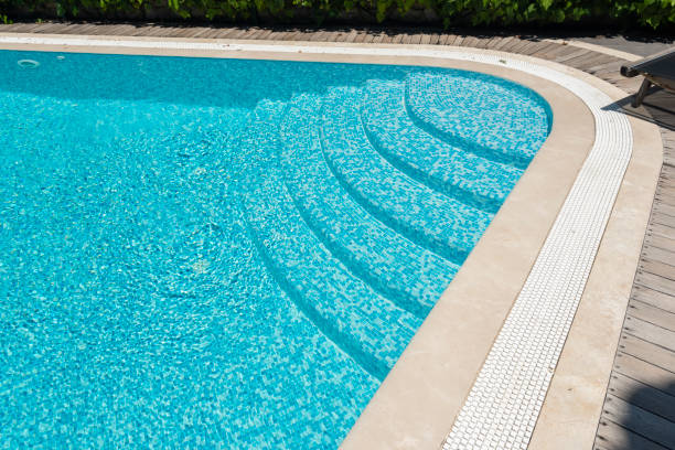 istock A swimming pool among green trees 2175672100