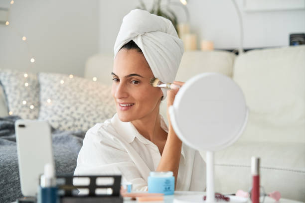istock Content woman applying makeup and recording blog 2175679658