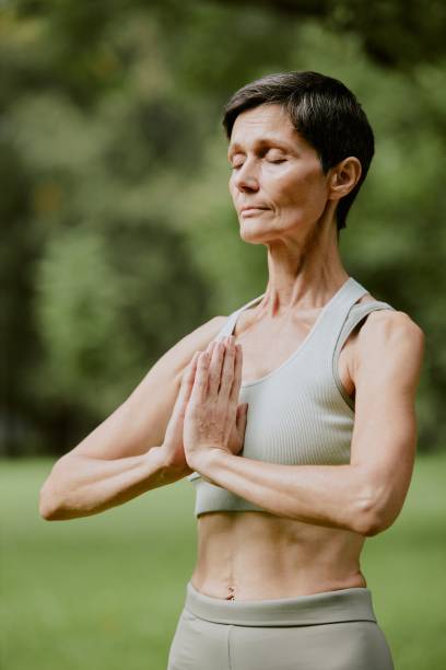 istock Woman with Close Eyes Mediating 2175680067