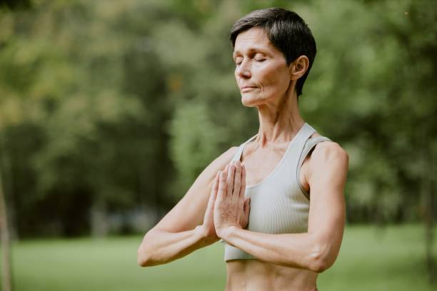 istock Woman Focused on Meditation 2175680154