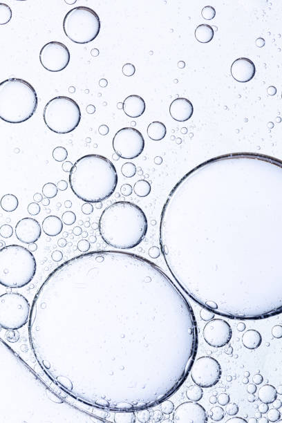 istock Macro drink bubbles,collection water bubble black oxygen air, in underwater clear liquid with bubbles flowing up on the water surface, isolated on a white background 2175681558