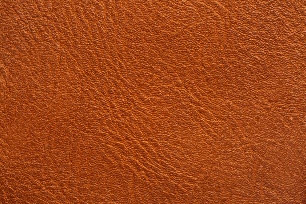 istock Brown macro synthetic leather,Synthetic leather brown background texture. Brown leather textured background. 2175681773