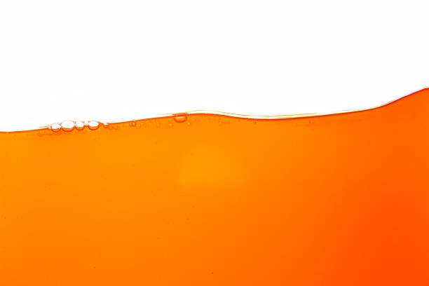 istock Orange juice texture isolated on white background,Close up bright orange juice texture for health and nature waves 2175681916