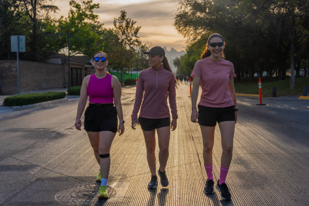 istock Three Latina women walking after outdoor workout at sunset 2175687310