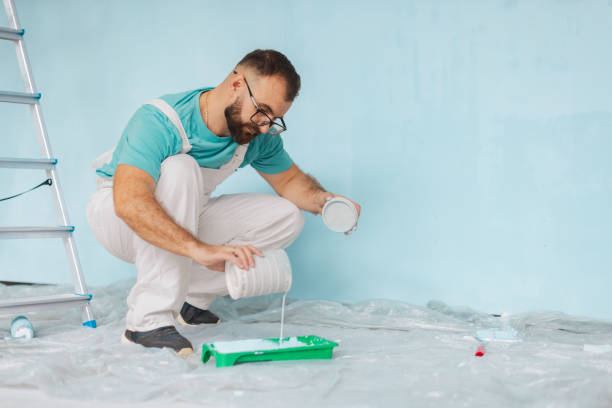 istock Careful paint preparation before painting blue interior 2175687533