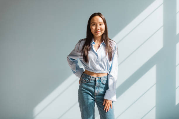 istock Casual fashion in sunlight highlighting woman's style. 2175687875