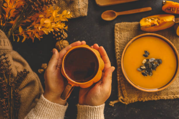 istock Cup of tea in hands, autumn mood 2175689832