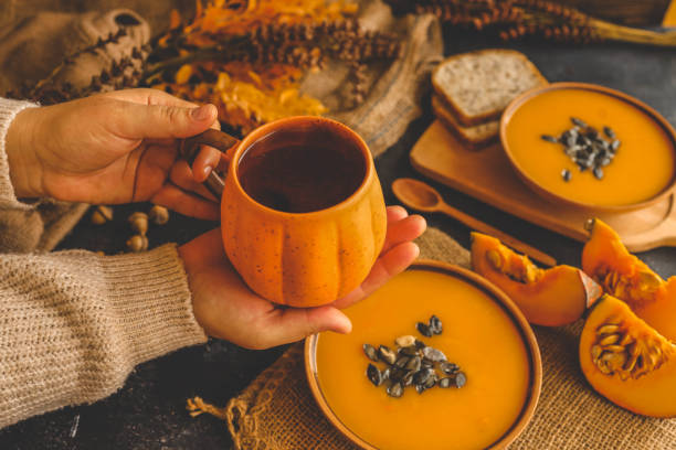 istock Cup of tea in hands, autumn mood 2175689839