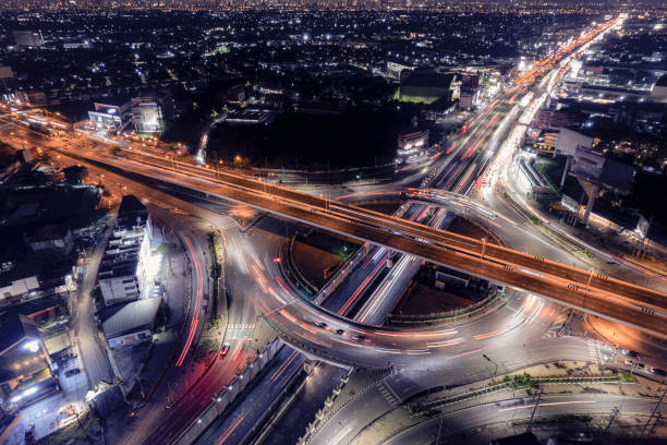 istock Expressway top view, Road traffic an important infrastructure, Drone aerial view fly in circle, traffic transportation, Public transport or commuter city life concept of economic and energ, transport. 2175690455