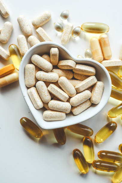 istock Tablets and vitamins on white background, banner advertising, pharmaceuticals 2175690827