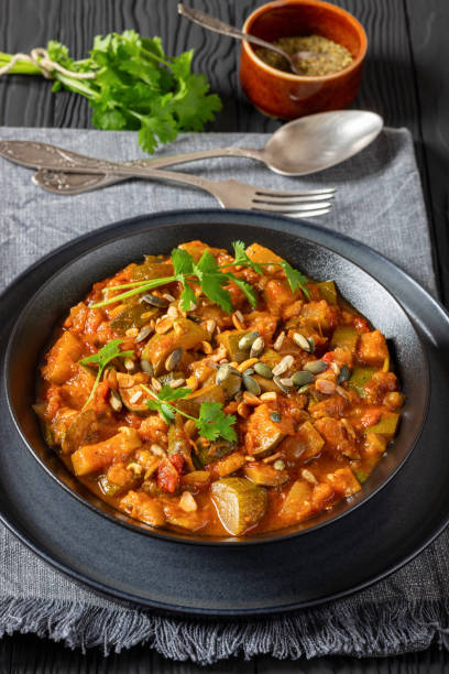 istock healthy zucchini stew in tomato sauce, top view 2175699487