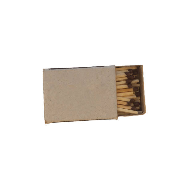 istock A cardboard paper matchbox with a partially open top, in which matches lie, with a dark incendiary chirping head, isolated on a transparent white background. Top view. Blank for advertising. 2175704533