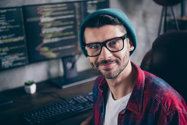 istock Photo of intelligent smart programmer wear spectacles creating safety project modern gadget indoors workplace workshop home 2175705484