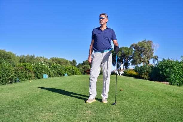 istock A golfer on the golf course thinking about his shot 2175706905